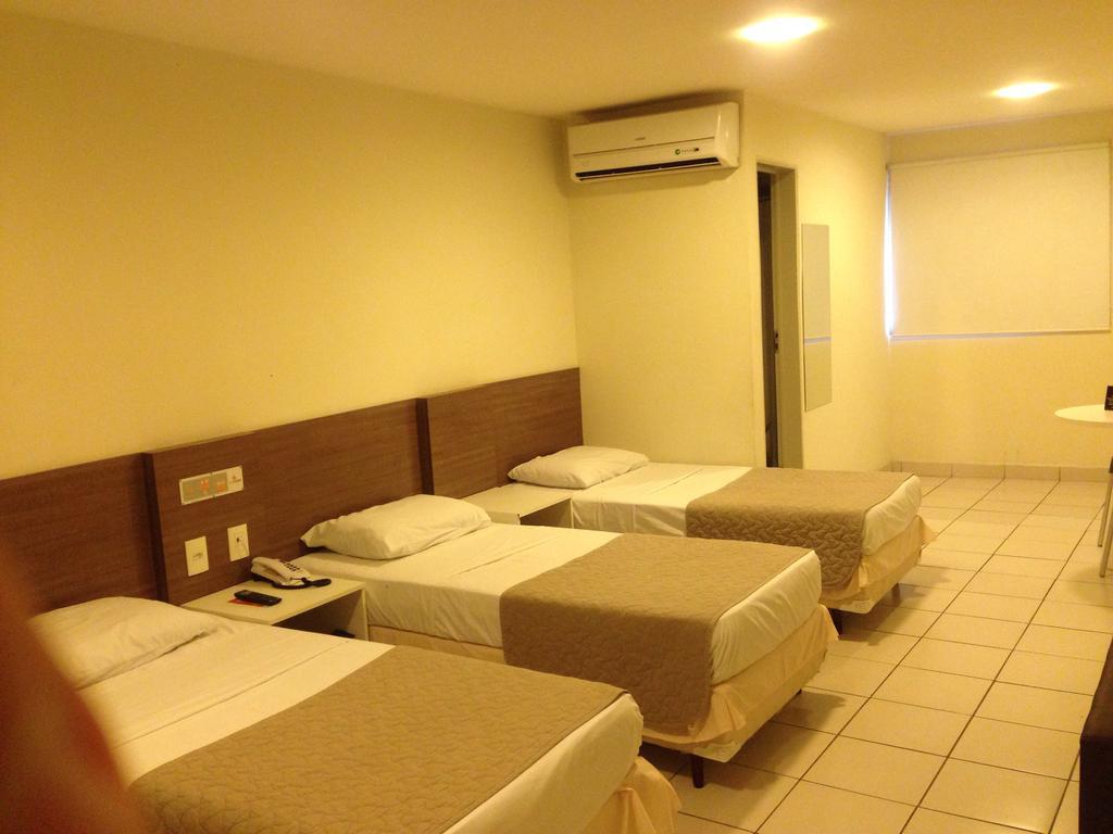 Hotel Central การัวรู ภายนอก รูปภาพ