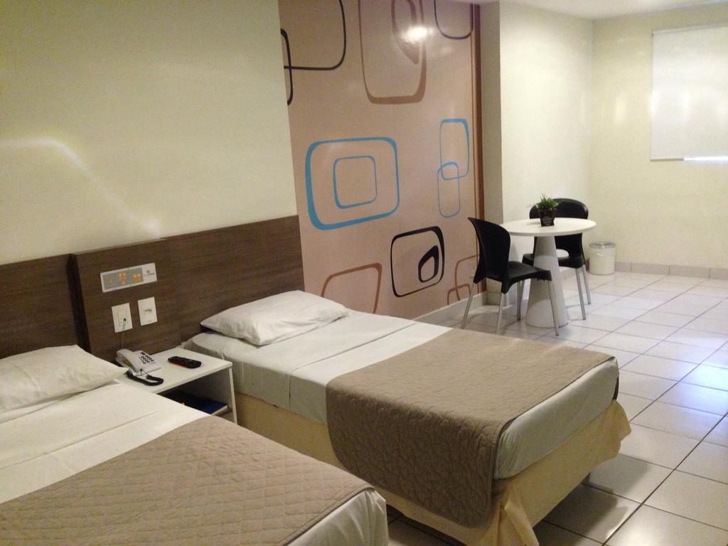 Hotel Central การัวรู ภายนอก รูปภาพ